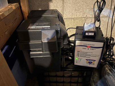 Pro Series battery-backup sump controller and protected battery installed in a Central Ohio basement