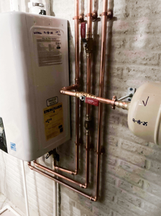 Leaking water heater inspected by a Central Ohio plumber