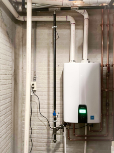 Navien tankless water heater installed in a Central Ohio basement