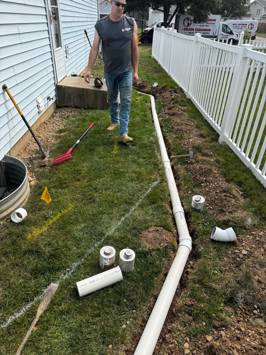 West Jefferson Plumbing and Heating technician completing a drain and sewer service project in Central Ohio
